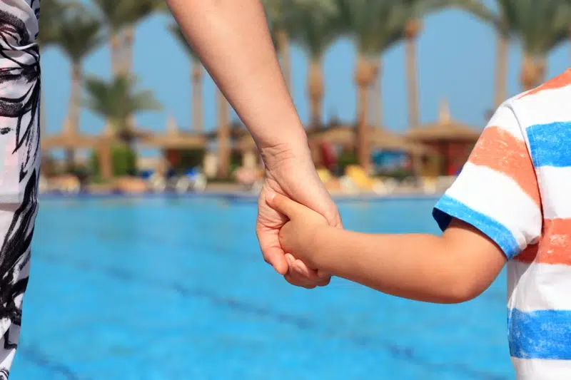 Supervising children at the pool for safety and prevention.