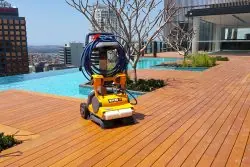 Pool cleaning equipment on rooftop deck at Skye Apartments.