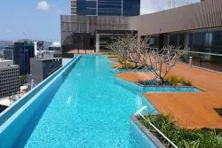 Luxury rooftop pool with city views at Skye Apartments, Brisbane.