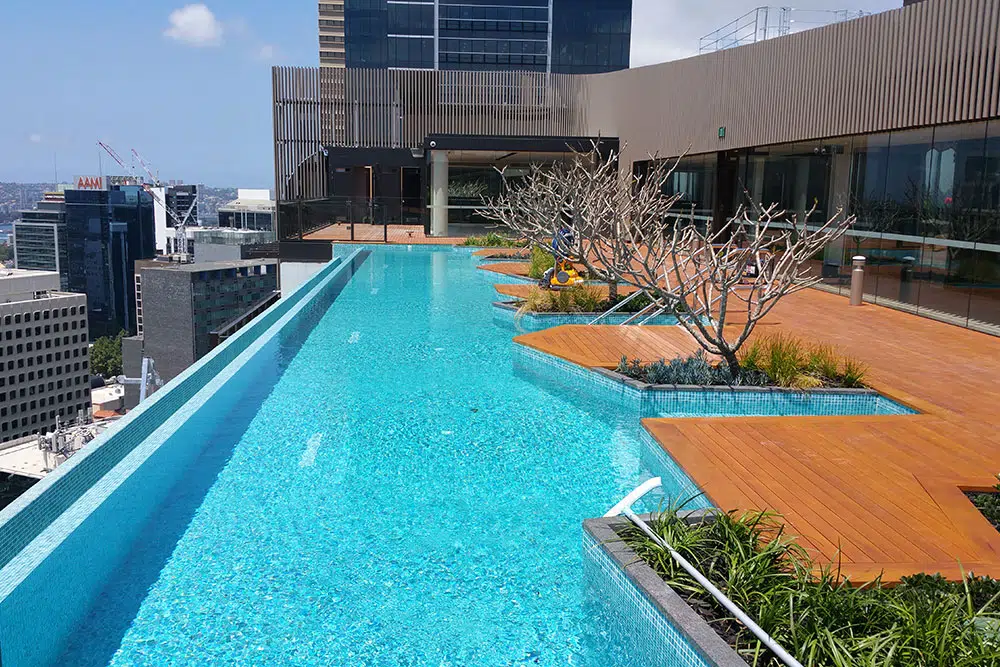 Luxury rooftop pool with city views at Skye Apartments, Brisbane.